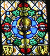 Queen Katherine's royal emblem, the Pomegranate, a symbol her mother Queen Isabel of Castile used in her own coat of arms.